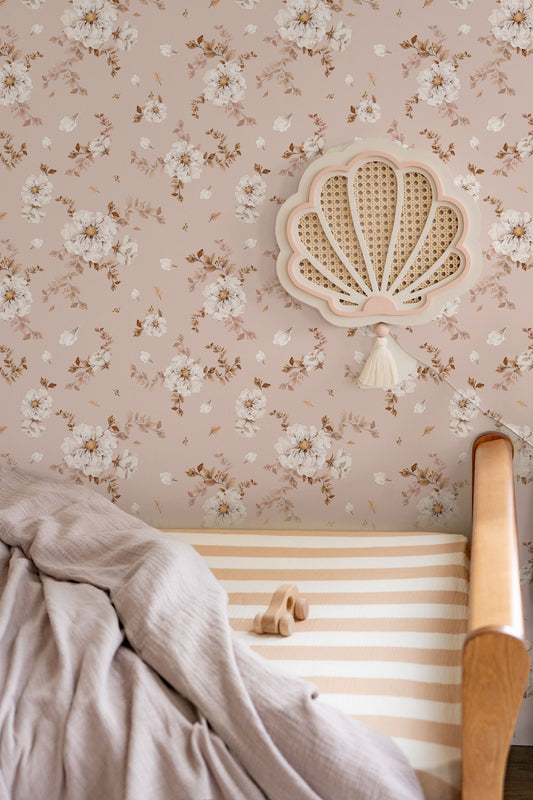 Wild Roses on Dusty Pink wallpaper styled in a cozy nursery with natural decor – Matuu wallpaper