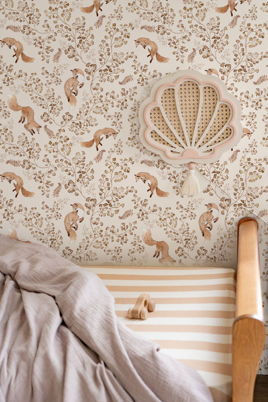 Playful Fox on Beige wallpaper by Matuu in cozy kids’ room with rattan bed and soft blanket