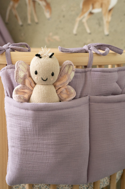 Close-up of Matuu Lavender Bliss organizer – gentle lavender tone with teddy bear in pocket.