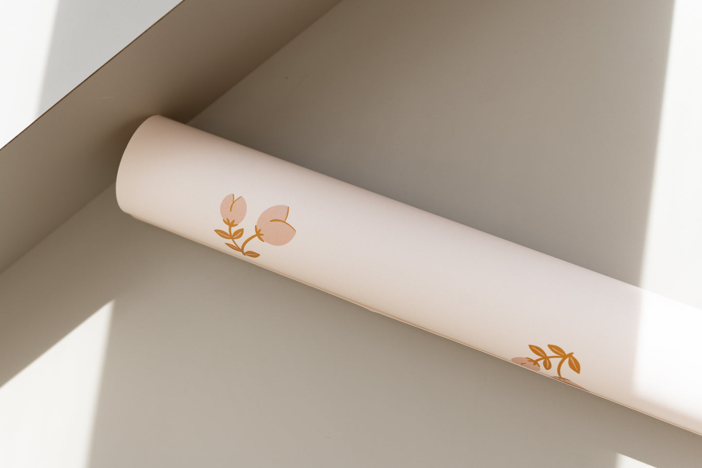 Close-up of Matuu Little Buds wallpaper – subtle botanical details on cream-colored paper.