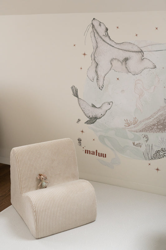 Matuu dolphin wall stickers above white crib – underwater-themed nursery in soft green tones