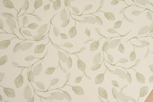 Detailed pattern view of Matuu Eucalyptus Whimsy green wallpaper with subtle leaf design