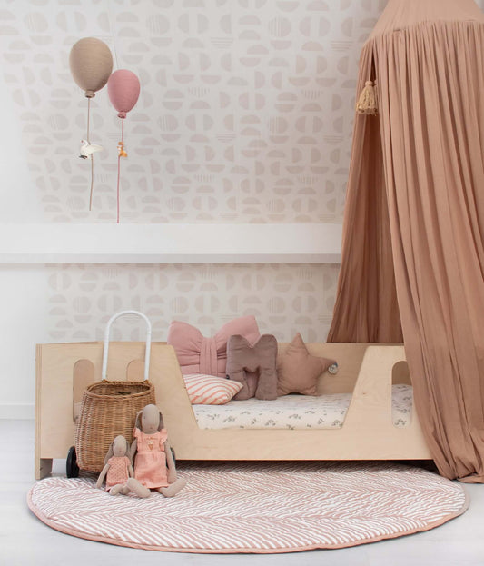 Matuu Desert wallpaper in kids’ room with terracotta canopy and cozy bed