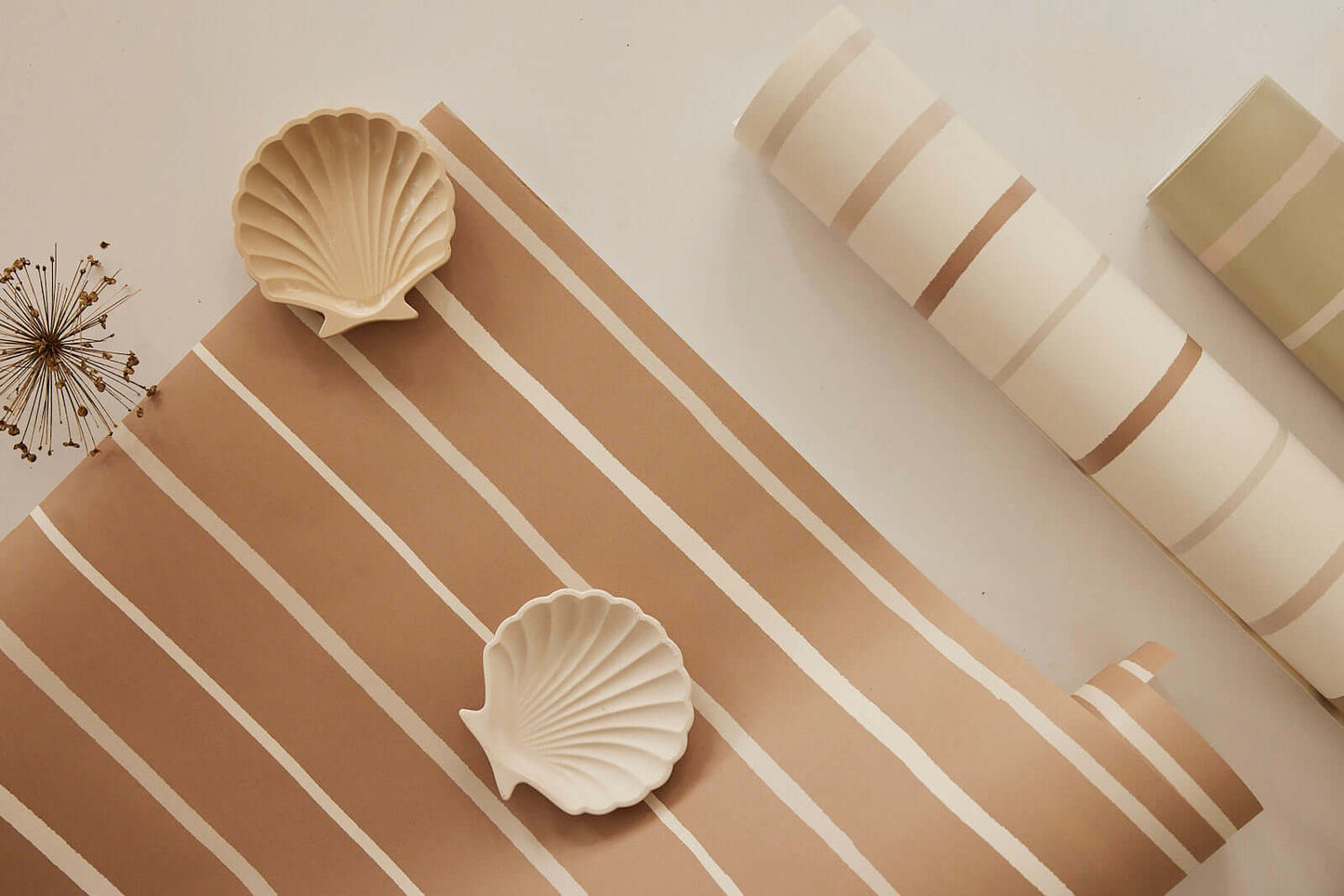 Neutral Stripes on Brown wallpaper by Matuu, close-up with shells, Japandi design, handcrafted