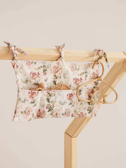 Front view of Matuu “Honeysuckle” bed pocket – elegant floral cotton design bringing charm and functionality to the nursery.