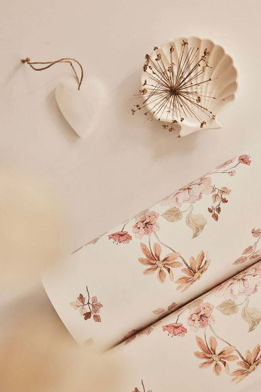 Elegant close-up of Vintage Meadow on White wallpaper by Matuu paired with decorative seashells, showcasing refined botanical design