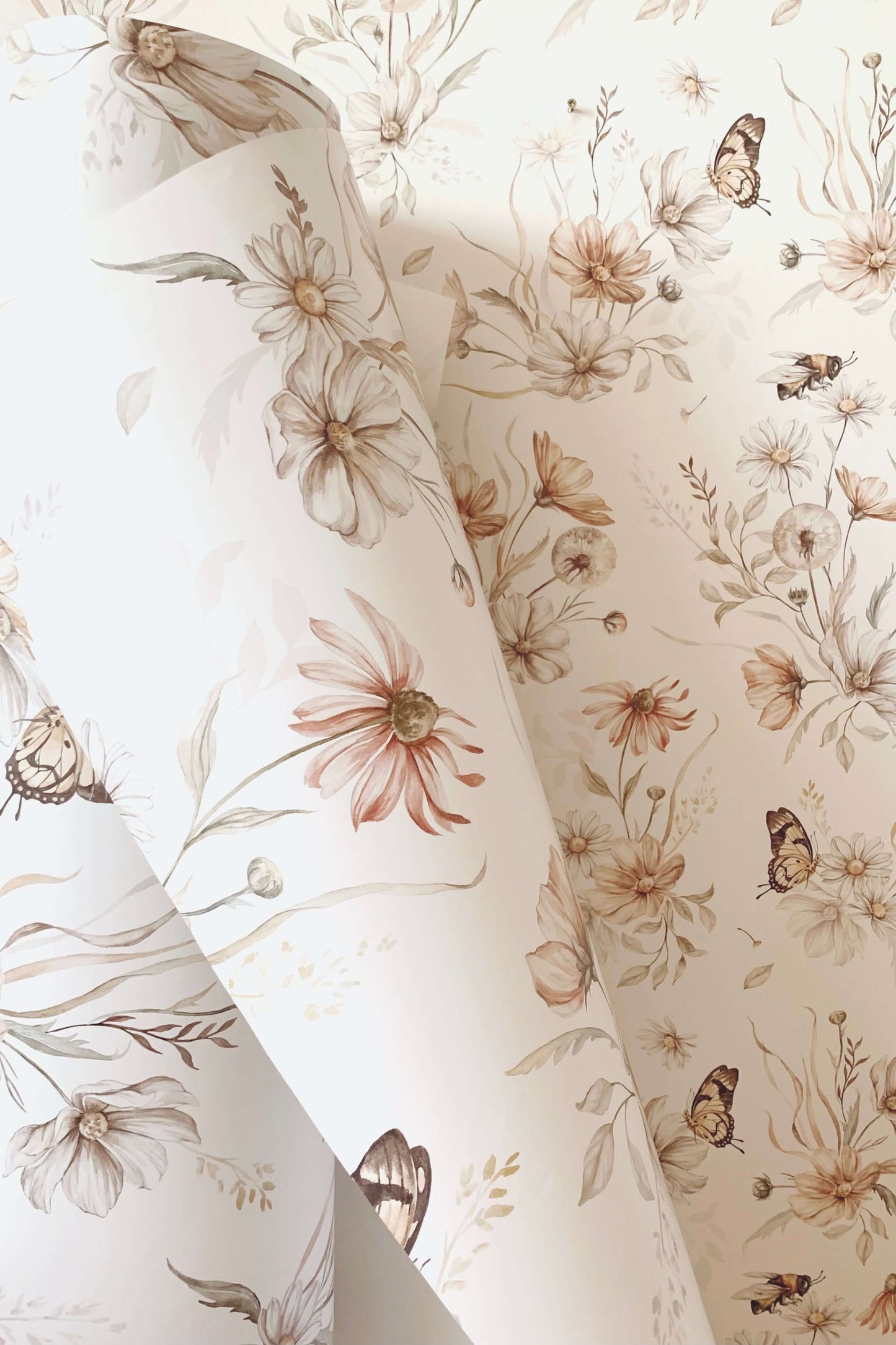 Close-up sample of Golden Meadow on white wallpaper showing brushstroke details and soft tones.
