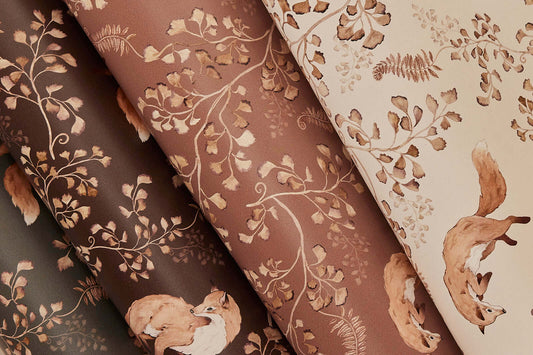 Rolled Playful Fox on Light Brown wallpaper showing charming fox pattern on warm earthy background
