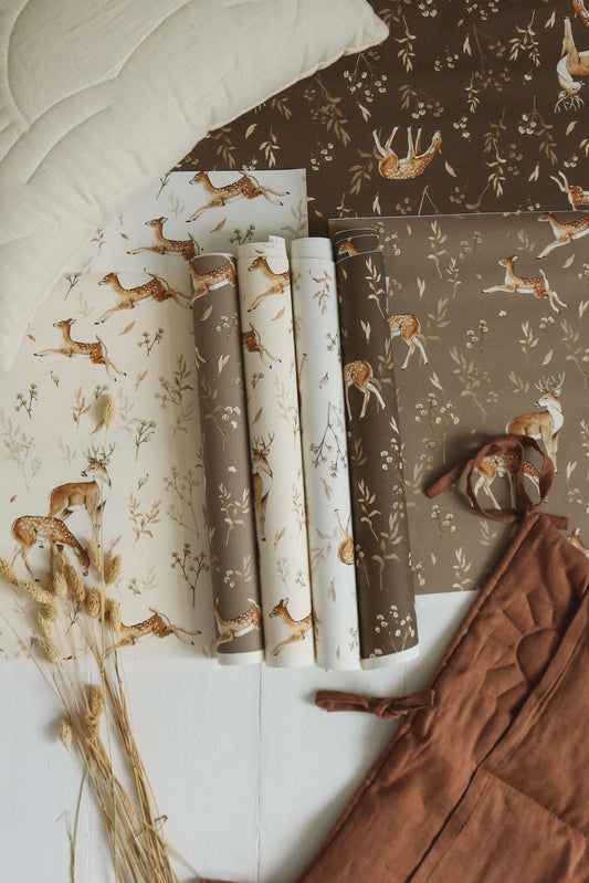 Matuu Deer Glade white wallpaper rolled-up view showing pattern and non-woven texture