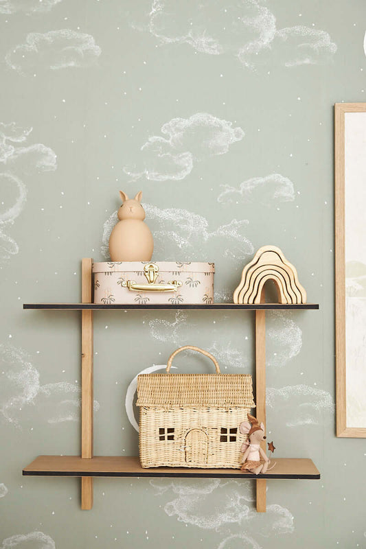 Matuu The Night Sky green wallpaper with wooden shelves and decorative items