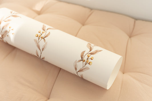 Brown Leaf Garland on White wallpaper styled in a cozy nursery with natural decor – Matuu wallpaper